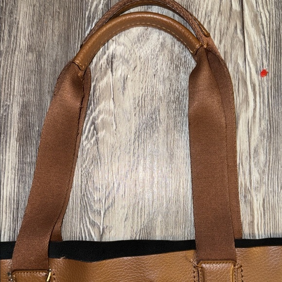 bill roms vintage canvas and leather backpack Lennon & TOBACCO/COGNAC Size:12-16 wt Reel Tanzania Inside the backpack sewn PowerPro - Super 8